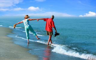 Carefree Couples Innsider Walk on the Beach