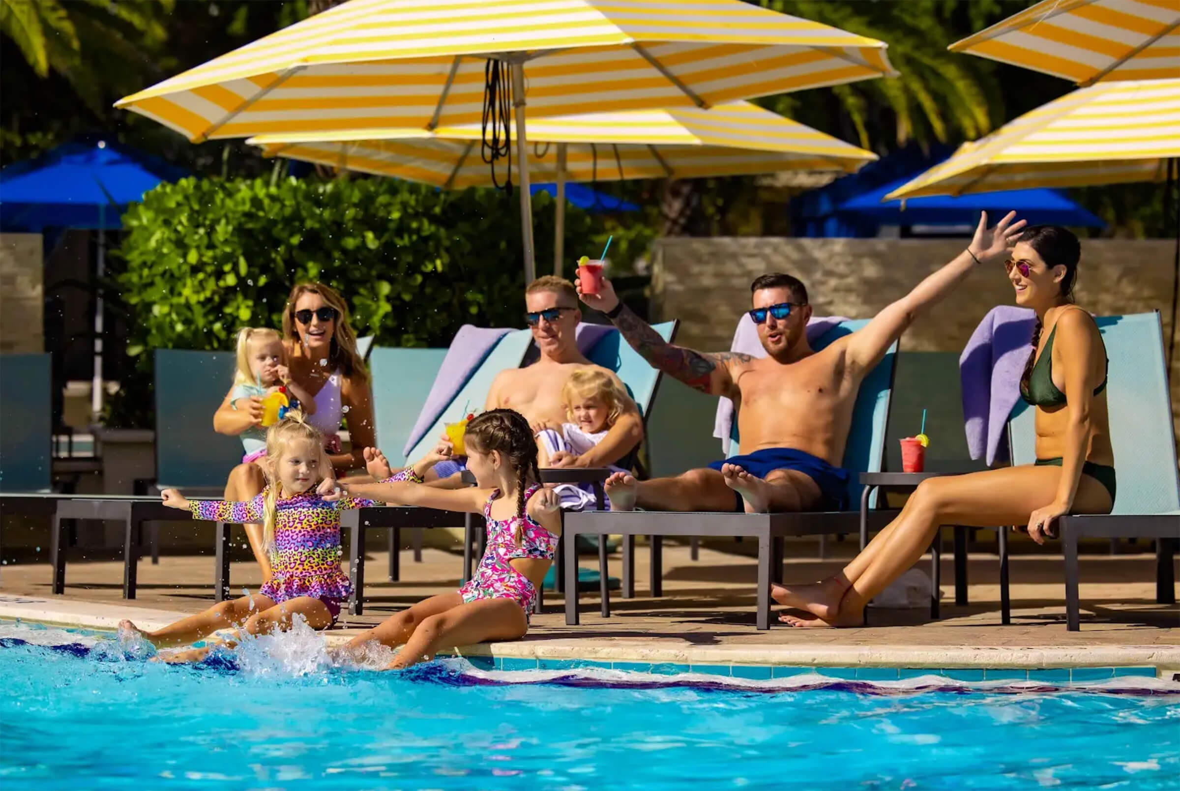 families having fun at the pool - captiva island accommodations